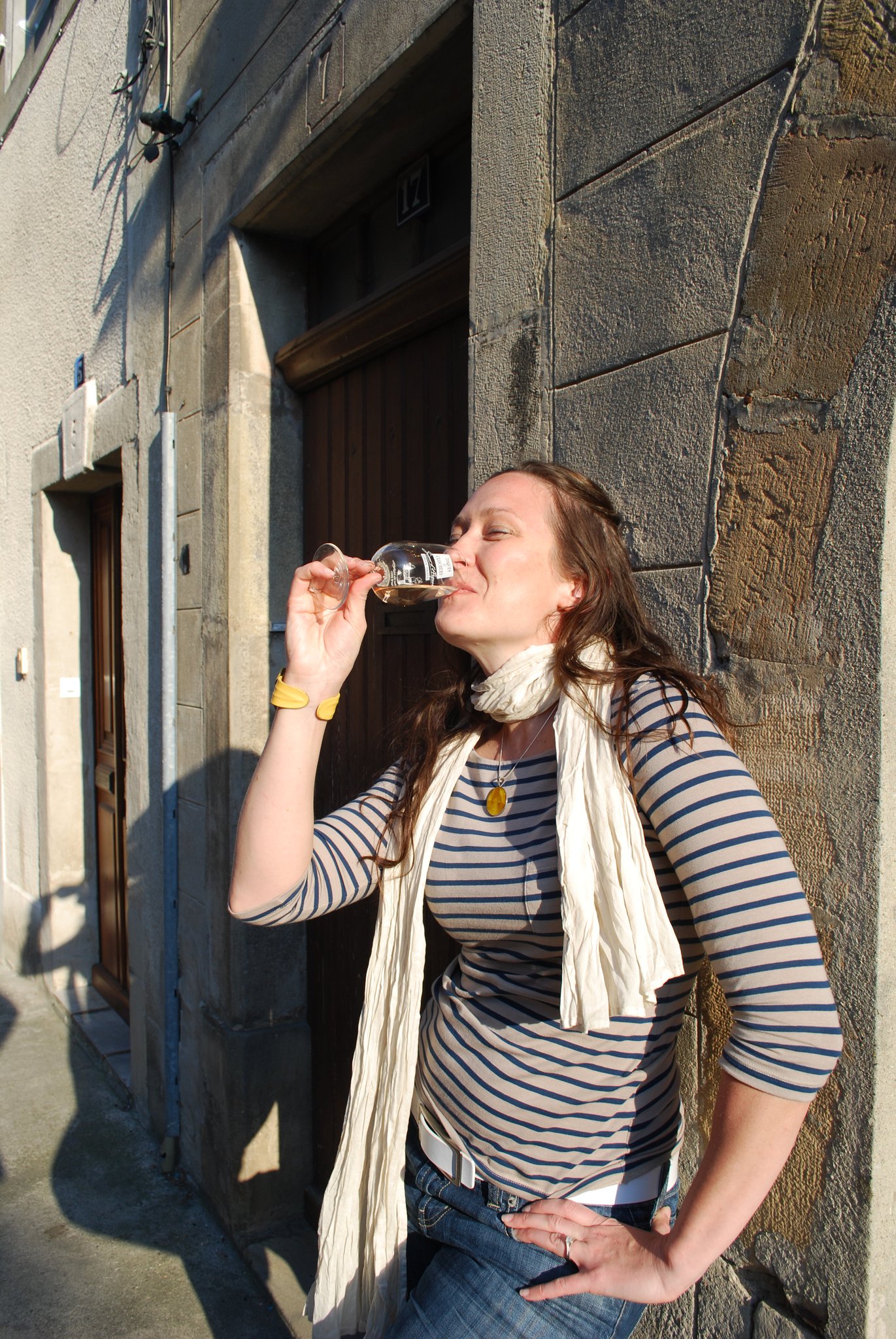 Leah Deane, fine wine specialist, sipping wine in Carcassonne, France